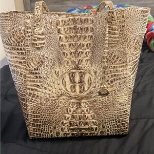 Brand new,can be used for a school/laptop bag diaper bag,work bag, very pretty